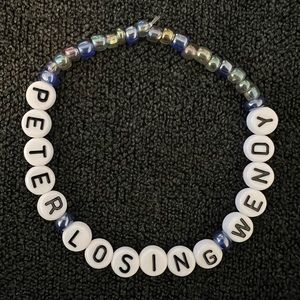 Taylor Swift cardigan friendship bracelet